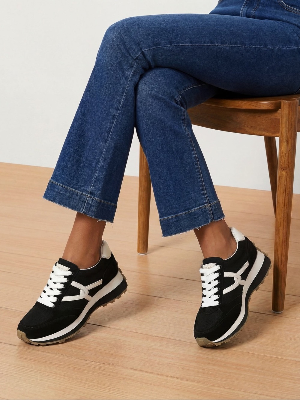 Veronica Beard Valentina sneakers in black and white.